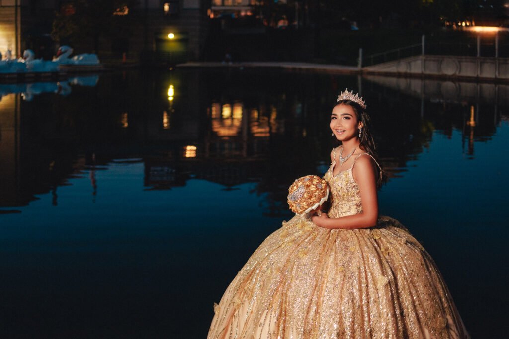Golden dress details contrasting with the blue water of the Canal Walk