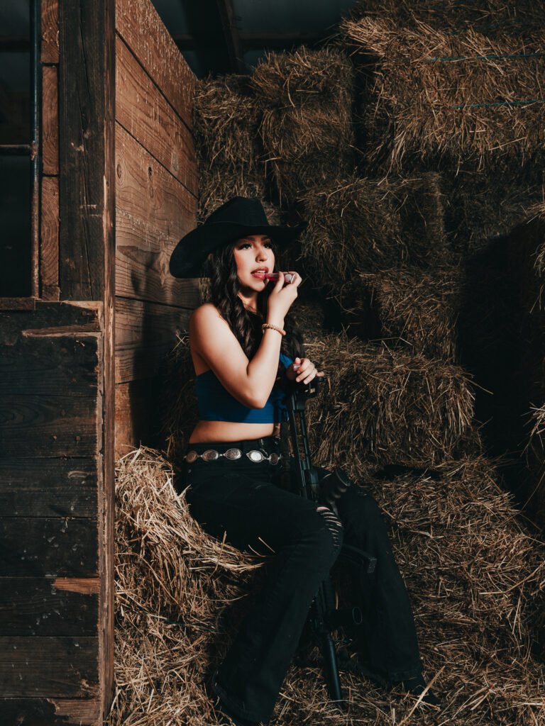 Professional birthday cowgirl photoshoot in a rustic stable Indianapolis